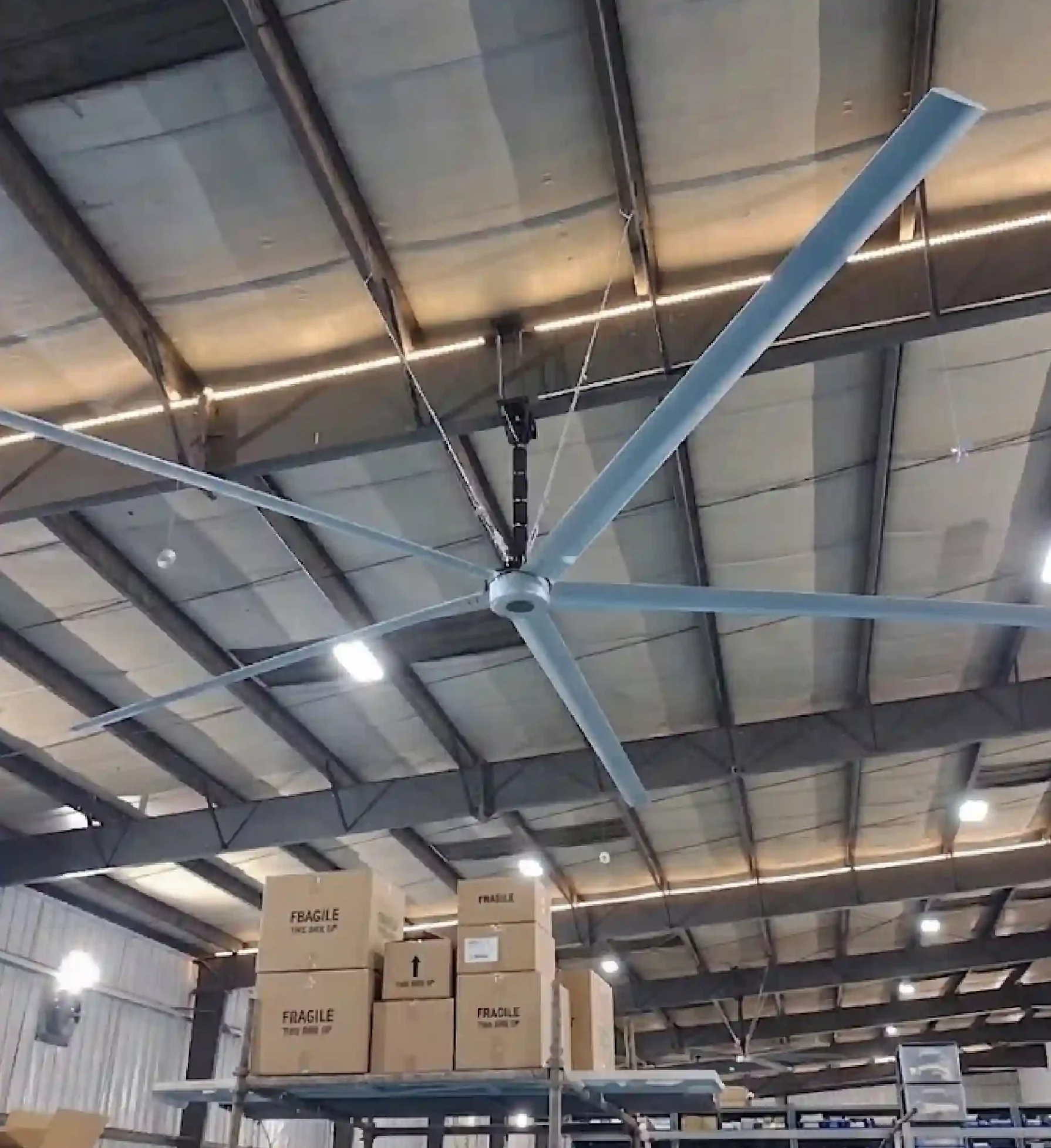 Optimize your facility's climate with our High-Volume Low-Speed (HVLS) industrial ceiling fans. Maximize airflow, cut energy costs, and improve warehouse comfort.